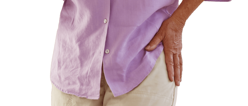 Someone gripping their hip in pain image